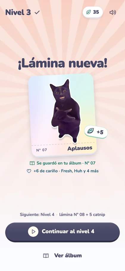 Captura de la app: pantalla ¡Lámina nueva! con el michi Aplausos.